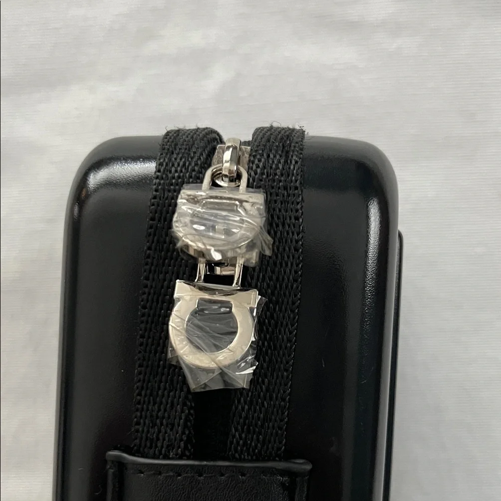 Salvatore Ferragamo Glossy Black Ridged Hard Case